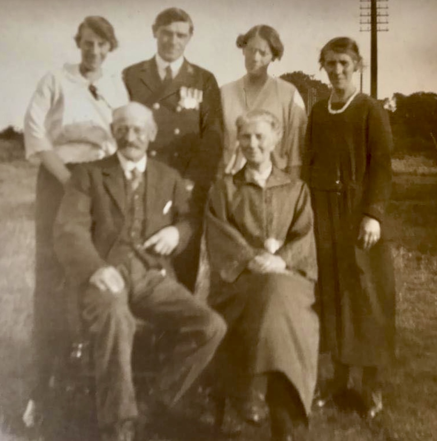 A formal family group portrait from the early twentieth century