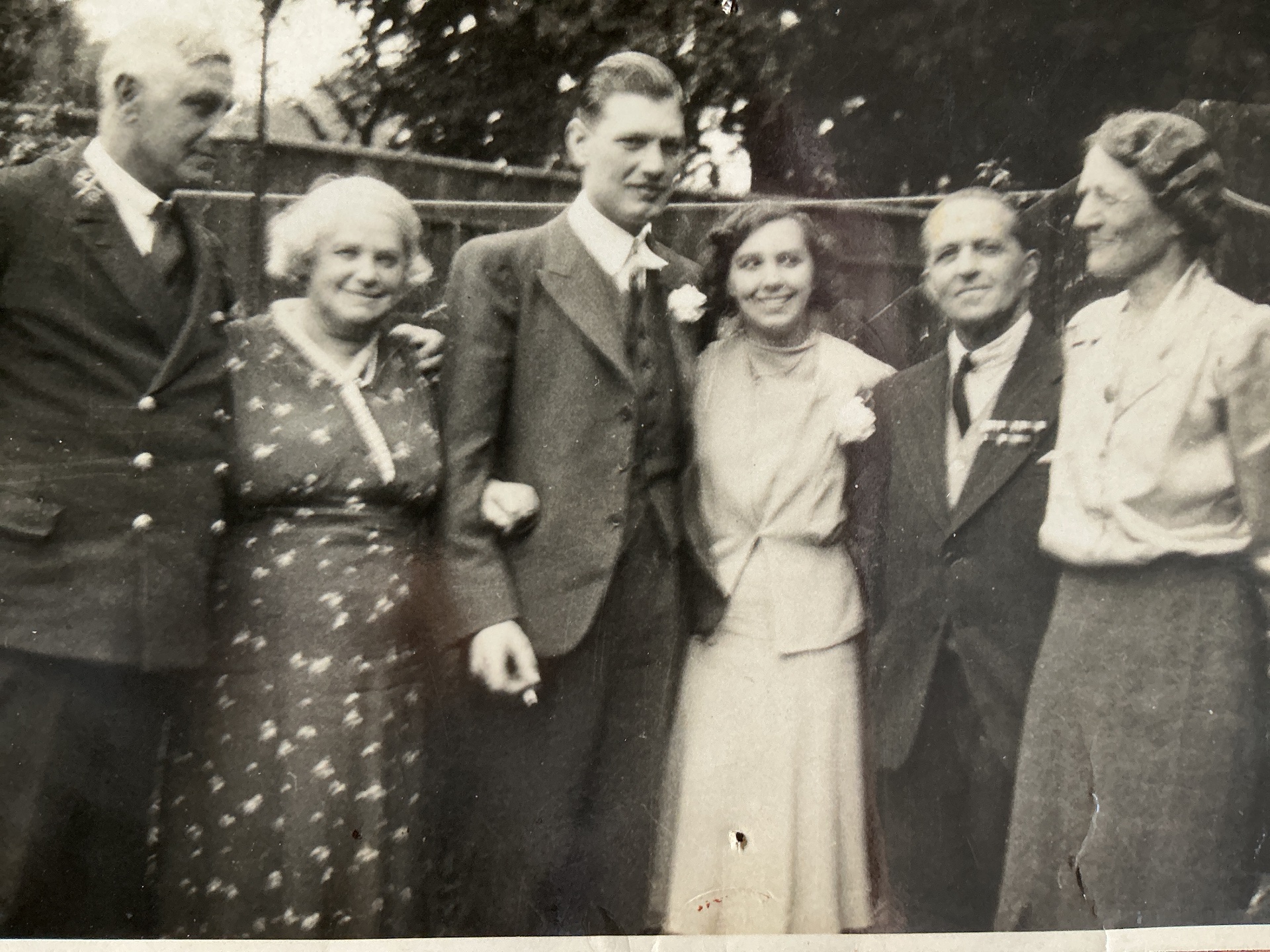 A historic family portrait with a man, a woman and two children